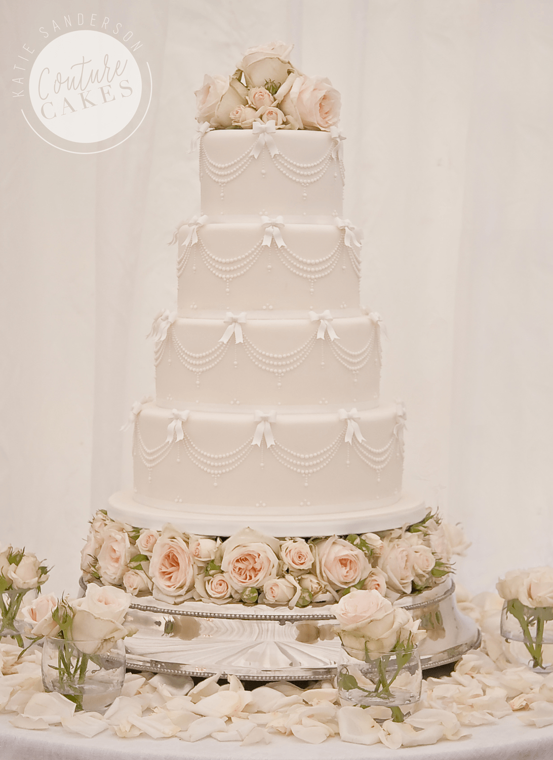 Pearl Drapes Wedding Cake: Serves 180 portions, Price category C £795 plus flowers